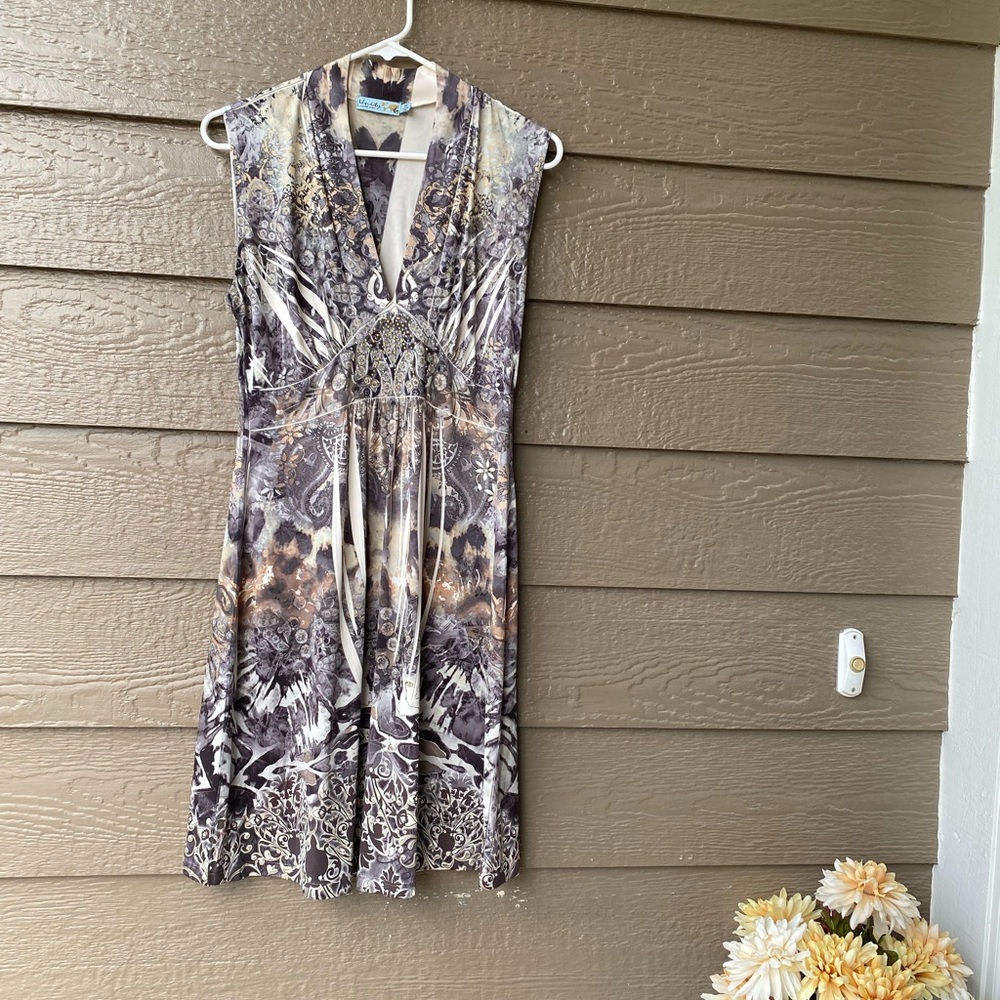 One World light weight with silver embellishment on front